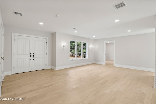 foyer entrance featuring light wood-type flooring