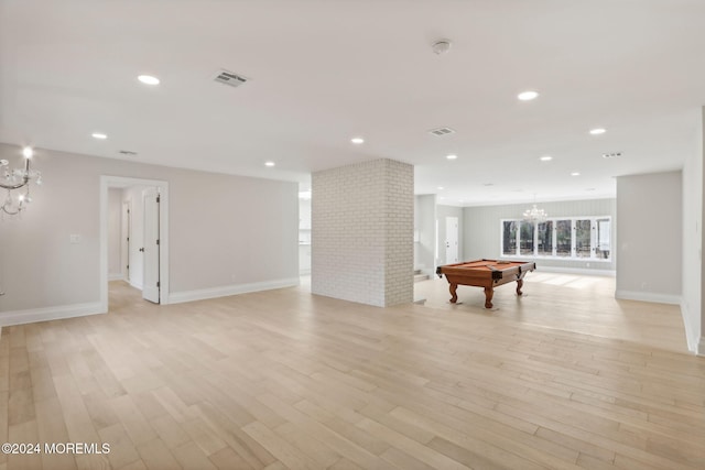 playroom with light hardwood / wood-style flooring, a notable chandelier, and billiards