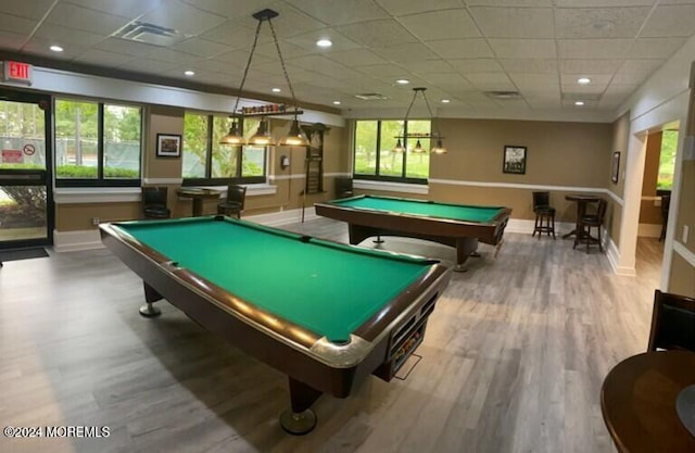 rec room featuring a paneled ceiling, wood-type flooring, and pool table