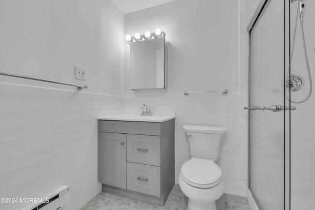 bathroom with walk in shower, toilet, tile walls, vanity, and a baseboard heating unit