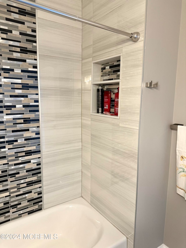 bathroom featuring  shower combination