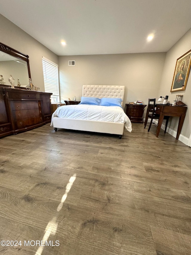 bedroom featuring hardwood / wood-style floors