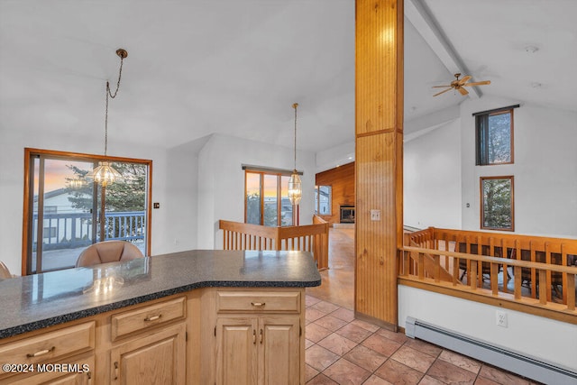 kitchen with light brown cabinets, a baseboard heating unit, ceiling fan with notable chandelier, hanging light fixtures, and vaulted ceiling with beams