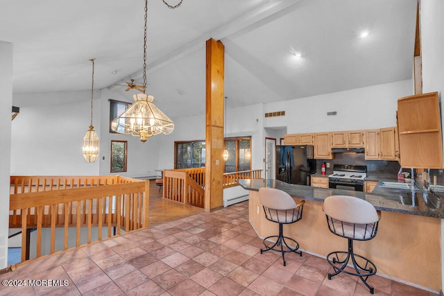 kitchen with high vaulted ceiling, black refrigerator with ice dispenser, light brown cabinetry, decorative light fixtures, and white range oven