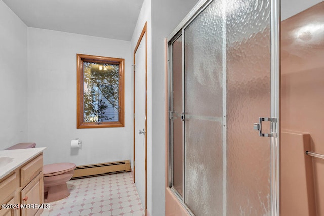 full bathroom with combined bath / shower with glass door, vanity, a baseboard radiator, and toilet