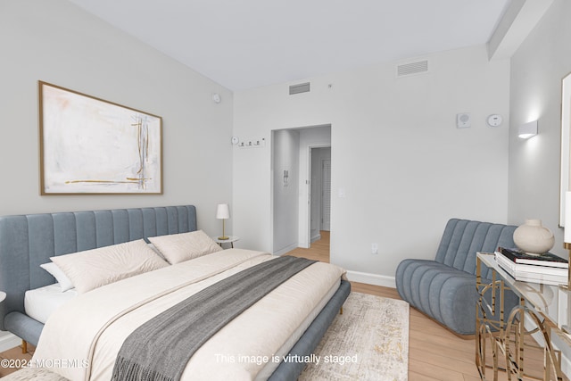 bedroom featuring light hardwood / wood-style floors