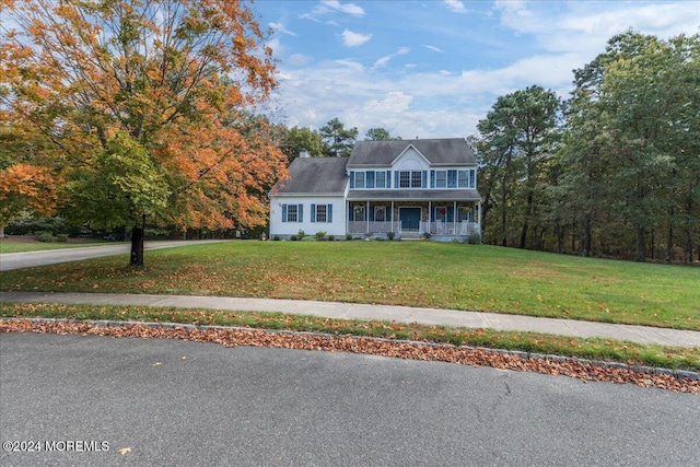 view of front of home featuring a porch and a front yard