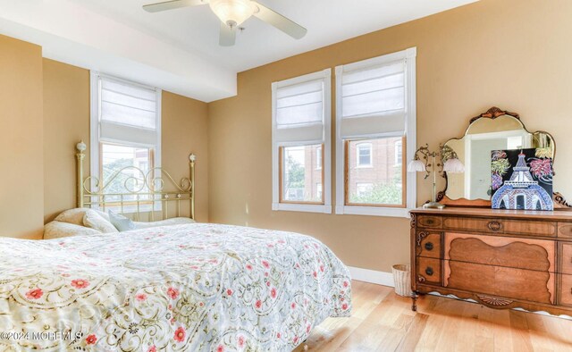 54 Olin St, Ocean Grove, NJ 07756 - bedroom with wood finished floors, baseboards, and ceiling fan