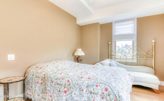 bedroom with wood-type flooring