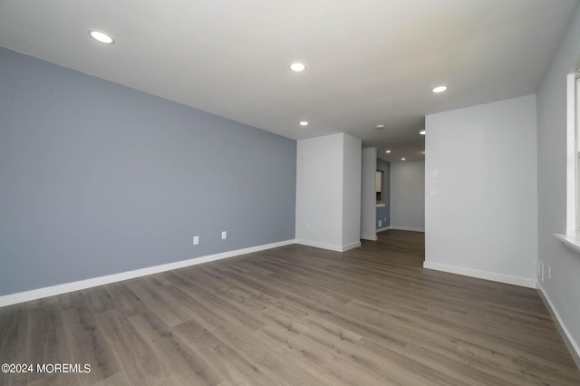 empty room featuring hardwood / wood-style flooring