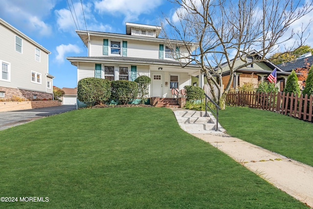 view of front of home featuring a front lawn