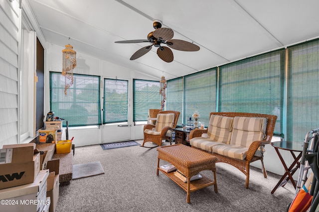 sunroom featuring ceiling fan and lofted ceiling