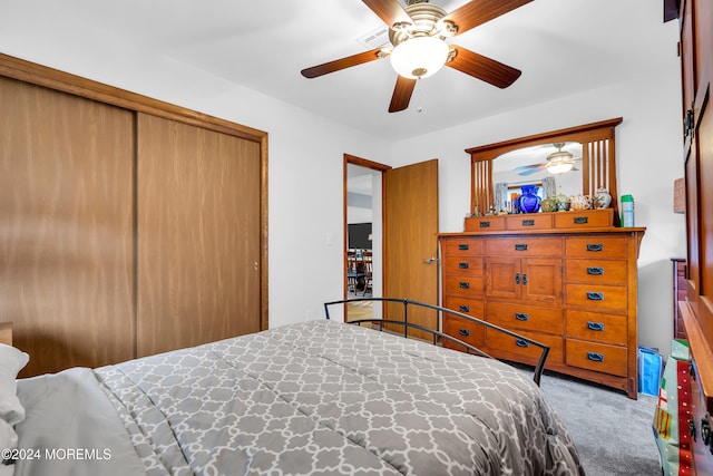 bedroom featuring carpet floors, a closet, and ceiling fan