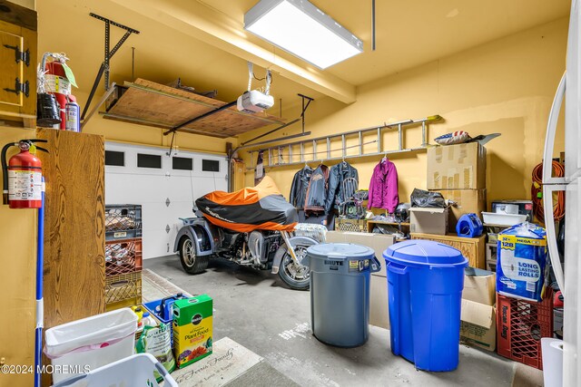 garage featuring a garage door opener