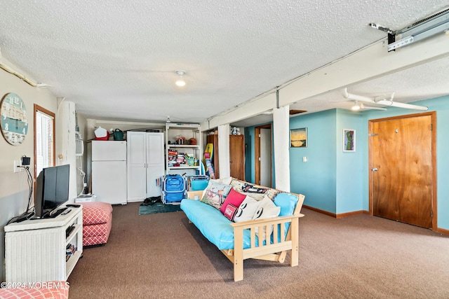 interior space with carpet and a textured ceiling