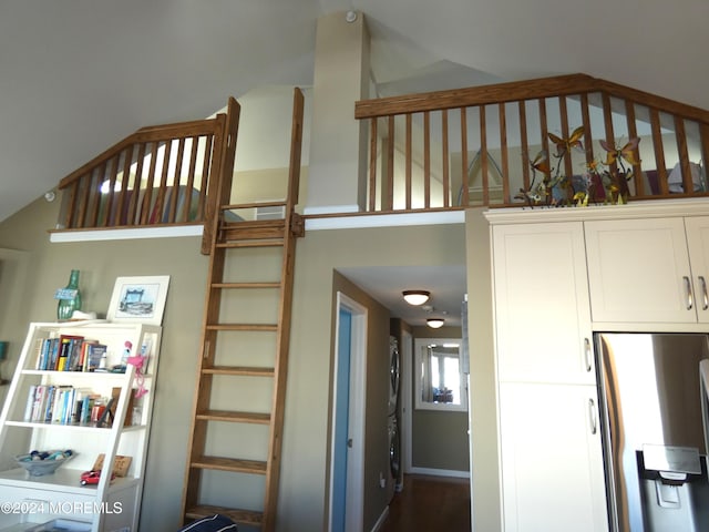 stairs featuring hardwood / wood-style floors