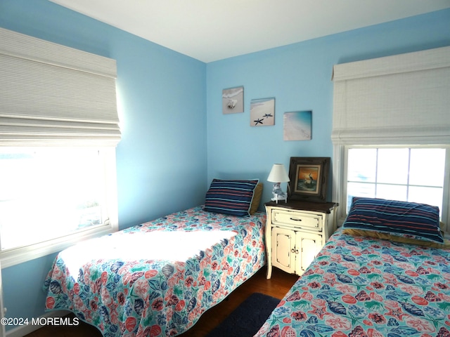 bedroom featuring dark wood-type flooring