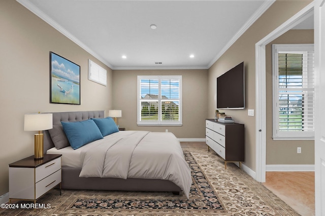 bedroom with crown molding