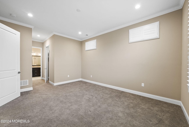 interior space with carpet and ornamental molding