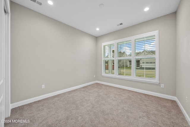 empty room with light carpet