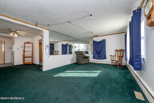 unfurnished room with carpet, a textured ceiling, baseboard heating, and ceiling fan