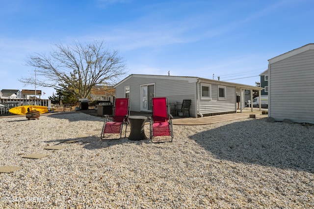 rear view of property with a patio