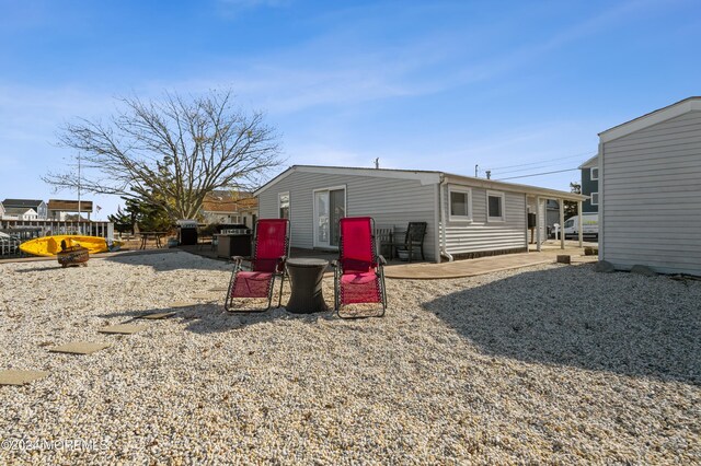 161 N Ensign Dr, Little Egg Harbor, NJ 08087 - rear view of property featuring a patio