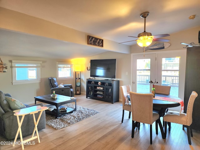 dining room featuring light hardwood / wood-style floors, a wealth of natural light, and ceiling fan