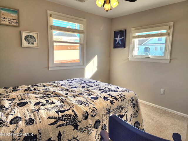 161 N Ensign Dr, Little Egg Harbor, NJ 08087 - bedroom with carpet floors, baseboards, and a ceiling fan