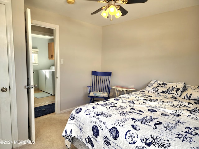 carpeted bedroom with ceiling fan and independent washer and dryer