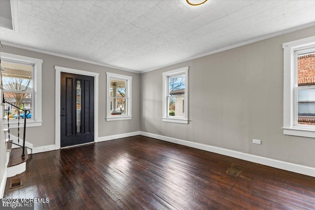 unfurnished room with hardwood / wood-style floors and ornamental molding