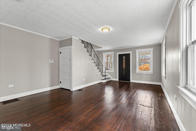 interior space featuring ornamental molding and hardwood / wood-style flooring