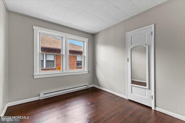 empty room with a baseboard radiator, crown molding, and dark wood-type flooring