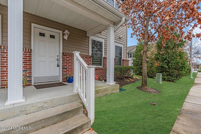 property entrance featuring a porch