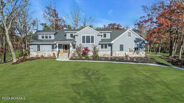 view of front facade with a front lawn