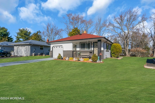 view of front of home featuring covered porch, a garage, and a front yard