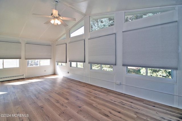 unfurnished sunroom with ceiling fan, lofted ceiling, and a baseboard radiator