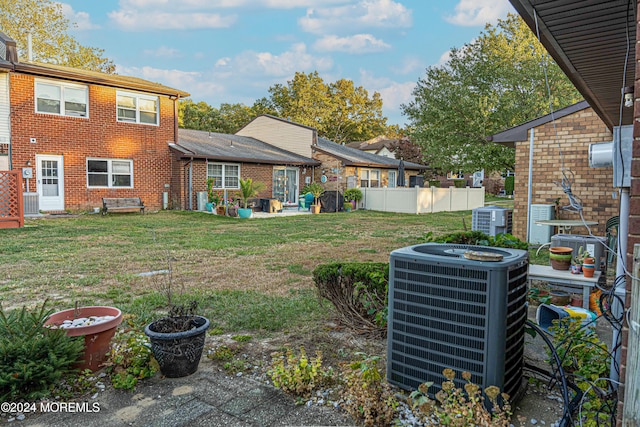 view of yard featuring central AC unit