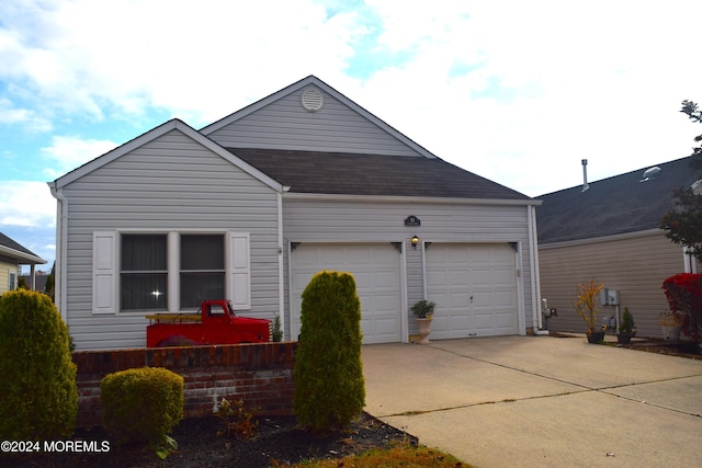 exterior space with a garage