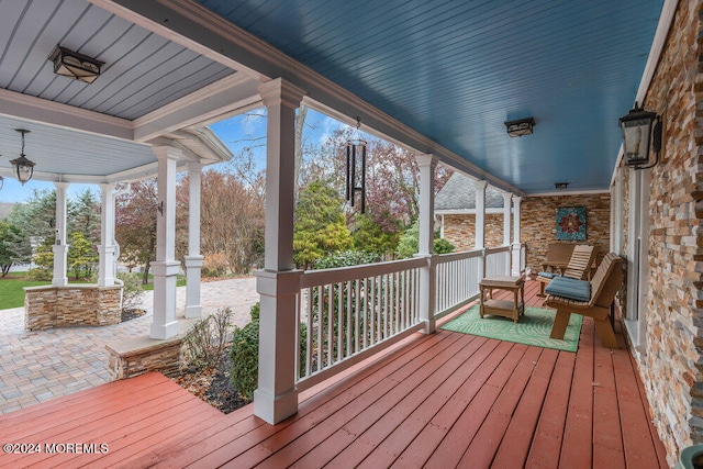 wooden terrace featuring a porch