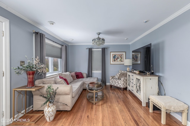 living room featuring crown molding and hardwood / wood-style flooring