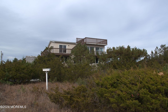 exterior space featuring a balcony