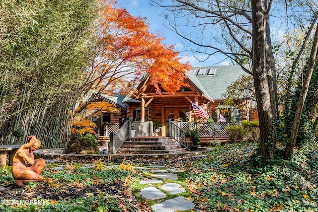 view of log-style house