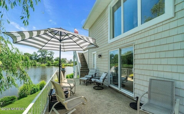 view of patio / terrace featuring a water view