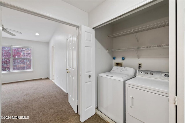 laundry room with separate washer and dryer, dark carpet, and ceiling fan