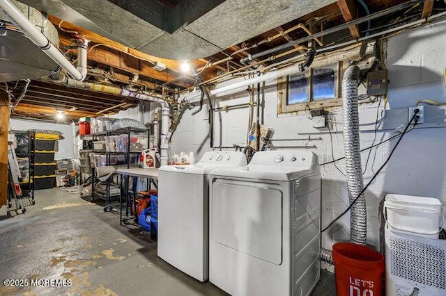 laundry room featuring separate washer and dryer