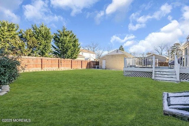 view of yard with a deck