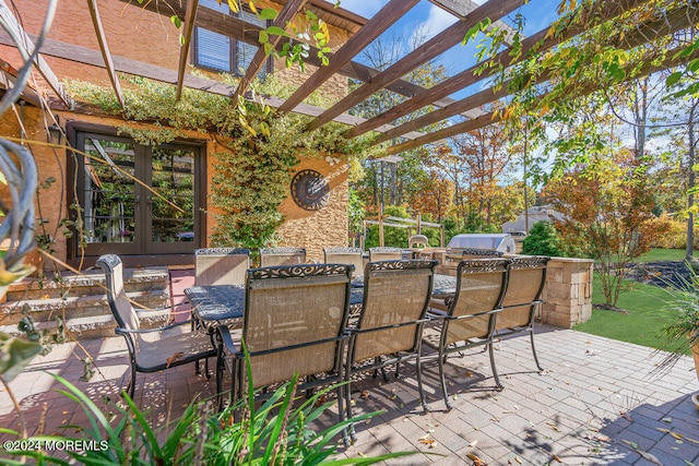 view of patio / terrace with a pergola and french doors