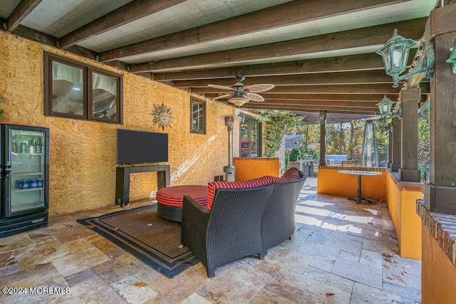 view of patio featuring ceiling fan