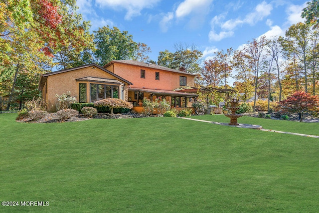 exterior space with a lawn